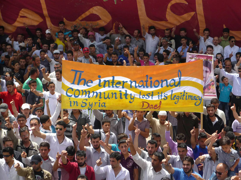Demonstrators protest against Syria's President Bashar Al Assad at Dael near Deraa on May 11. (Reuters)