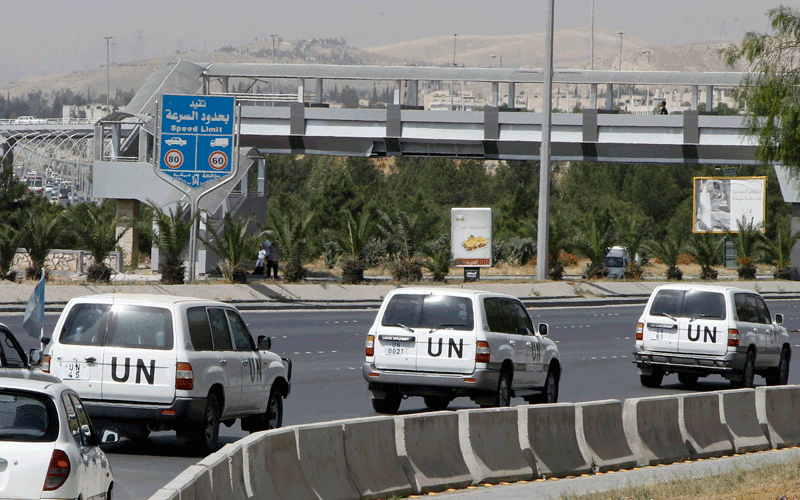 Members of the United Nations observers mission in Syria travel in UN vehicles as they leave the UN headquarters in Damascus, and head to the areas where protests against the regime of Syrian President Bashar al-Assad have been taking place. (REUTERS)