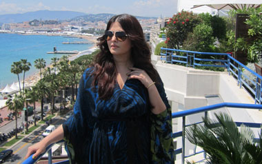 Aishwarya Rai Bachchan at a photocall in Cannes today in a Roberto Cavalli kaftan with shoes from Giuseppe Zanotti. (Supplied)