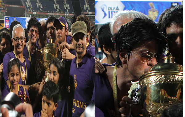 Bollywood star and co-owner of Kolkata Knight Riders Shah Rukh Khan kisses the DLF IPL 2012 cup as he celbrates his team's victory at the end of the IPL Twenty20 cricket final match, between Chennai Super Kings and Kolkata Knight Riders at The M.A.Chidambaram Stadium in Chennai on May 27, 2012. RESTRICTED TO EDITORIAL USE. MOBILE USE WITHIN NEWS PACKAGE (AFP)