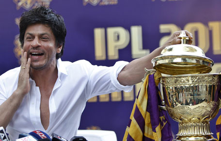 Kolkata Knight Riders team co-owner and Bollywood star Shah Rukh Khan poses with the Indian Premier League (IPL) trophy during a press conference at his residence in Mumbai, India. Kolkata Knight Riders won the IPL cricket title on Sunday, defeating two-time defending champion Chennai Super Kings by five wickets in a high-scoring final. (AP)