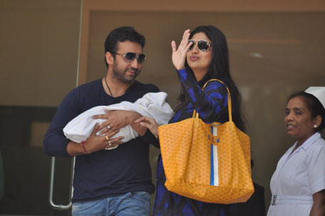 Shilpa Shetty, 36, gave birth to a baby boy on Monday, May 21. Seen here with husband Raj Kundra, the couple leave the hospital along with their baby boy. (AP)