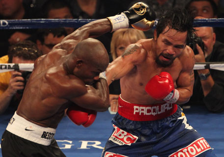Manny Pacquiao lands a right to the head of Timothy Bradley during their WBO welterweight title fight at MGM Grand Garden Arena in Las Vegas, Nevada. (AFP)