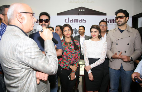 Bollywood superstars Abhishek Bachchan and Ajay Devgn with their 'Bol Bachchan' co-stars visit the Damas store in Oasis Centre, Dubai. (SUPPLIED)
