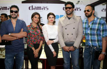 Abhishek Bachchan and Ajay Devgn with their Bol Bachchan co-stars visited the Damas store in Oasis Centre on June 30, 2012 as part of a promotional tour for their upcoming film. The four stars &ndash; Bachchan, Asin, Pratchi and Ajay Devgn, met with fans and competition winners inside the store.  (SUPPLIED)