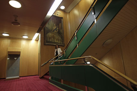 A painting of Queen Elizabeth II on board the liner. Britain's Queen Elizabeth II launched the QE2 in 1967. (AP)