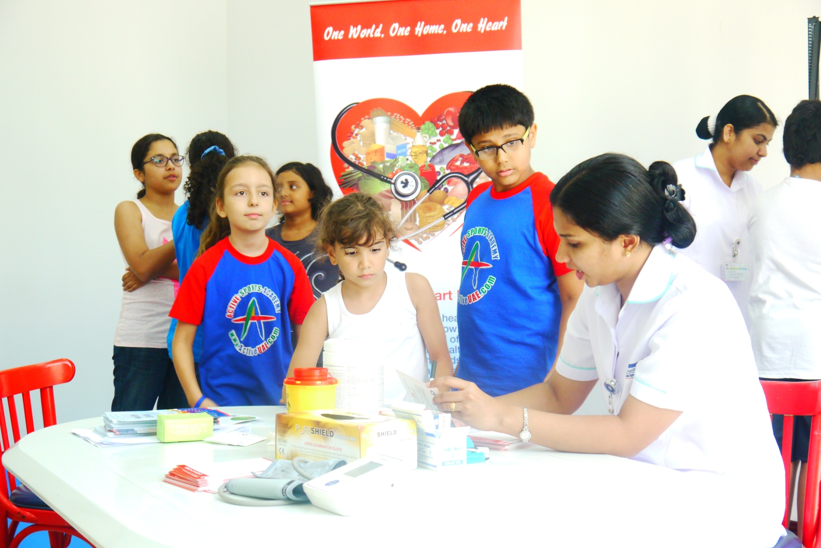 Boys undergo a healthcheck at Canadian Specialist Hospital as part of the Campaign to Fight Childhood Obesity. (SUPPLIED)
