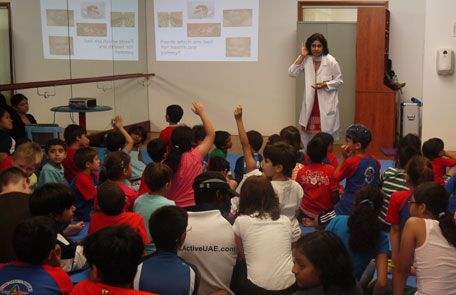 Dr. Liza Thomas, Specialist Internal Medicine, Canadian Specialist Hosptal with kids at Active Sports Academy. (SUPPLIED)