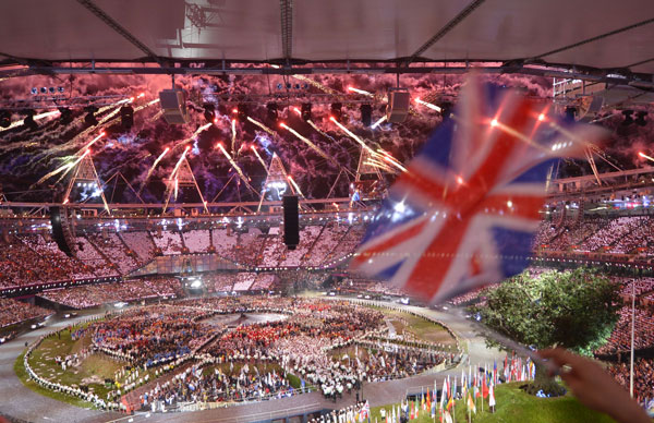 Fireworks go off over the Olympic stadium at the end of the opening ceremony of the London 2012 Olympic Games on July 28, 2012 in London. (AFP)