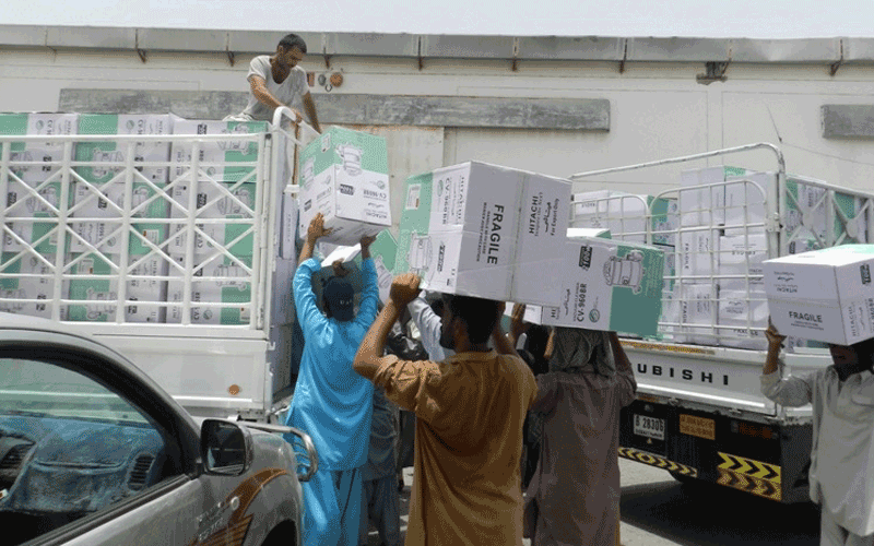 Confiscated electronic goods being moved out of warehouse (Supplied)