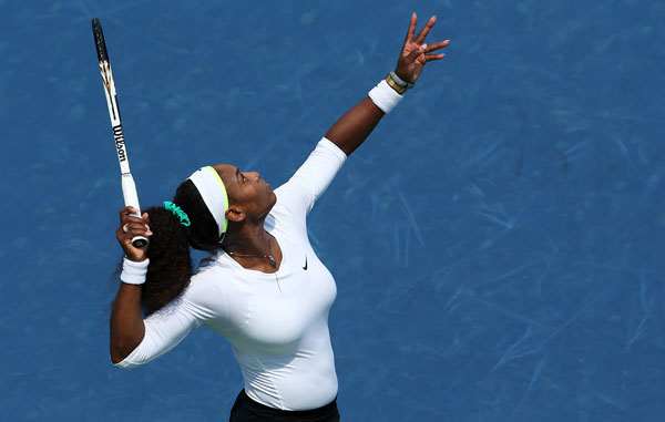 Serena Williams serves against Urszula Radwanska of Poland during day six of the Western & Southern Open at Lindner Family Tennis Center on August 16, 2012 in Mason, Ohio. (AFP)