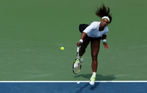 Serena Williams serves against Urszula Radwanska of Poland during day six of the Western & Southern Open at Lindner Family Tennis Center on August 16, 2012 in Mason, Ohio. (AFP)