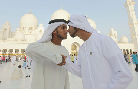 A file picture of people greeting each other during Eid Al Ftir at the Zayed Grand Mosque in Abu Dhabi. Photo by Erik Arazas