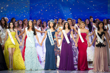 (Front L-R) Miss Thailand Vanessa Herrmann,  second place Miss Wales Sophie Moulds, winner Miss China Yu Wenxia, Miss Australia Jessica Kahawaty, Miss Brazil Mariana Notarangelo, and Miss India Vanya Mishra as they celebrate following the Miss World 2012 final ceremony at the Dongsheng stadium in the inner Mongolian city of Ordos. China's Yu Wenxia of China defeated more than 100 other hopefuls at the glittering ceremony held in the Chinese mining city of Ordos, on the edge of the Gobi desert. (AFP)