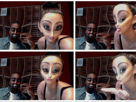 Rapper Kanye West and reality TV star Kim Kardashian poses in front of camera as aliens. (Pic: Twitter)