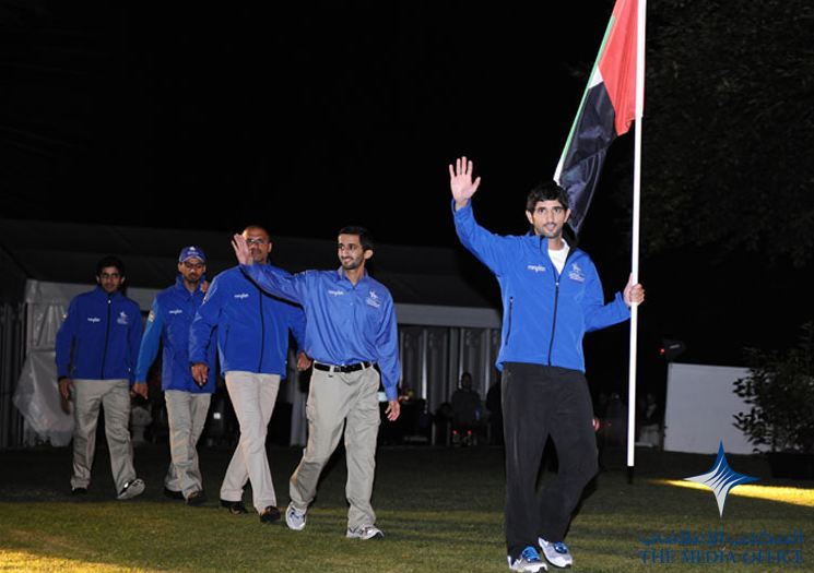 Hamdan bin Mohammed carrying UAE Flag during the opening ceremony. (SUPPLIED)