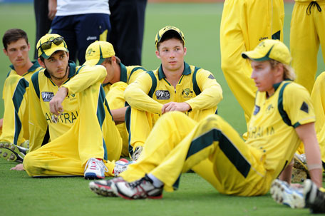 Australian players look dejected after the 2012 ICC U19 Cricket World Cup final against India at Tony Ireland Stadium on Sunday in Townsville, Australia. (GETTY)