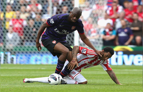 Jermaine Pennant of Stoke City is challenged by Abou Diaby (left) during the Barclays Premier League match against Arsenal at the Britannia Stadium on August 26, 2012 in Stoke on Trent, England.  (GETTY)