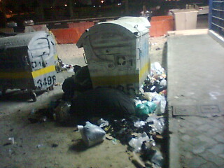 Garbage strewn outside bins which have been locked. (V M Sathish)