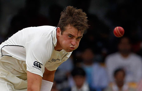 New Zealand's Tim Southee bowls during the third day of their second Test against India in Bangalore on Wednesday. (REUTERS)