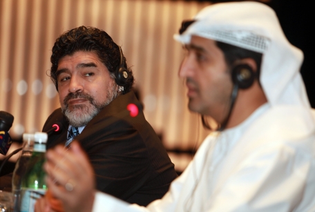 Diego Maradona listens as Dr Ahmed Al Sharif (right) speaks during his unveiling as Dubai Sports Council's ambassador for sports at a press conference held at the Burj Khalifa Armani Hotel on Sunday. (PATRICK CASTILLO)