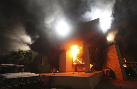 The US Consulate in Benghazi is seen in flames during a protest by an armed group said to have been protesting a film being produced in the United States. (REUTERS)