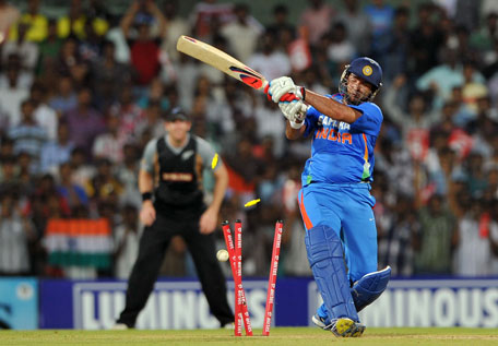 India's Yuvraj Singh is bowled by New Zealand's James Franklin (not pictured) during the second T20 match at the M.A. Chidambaram Stadium, in Chennai on September 11, 2012. (AFP)