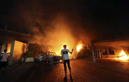 US Consulate in Benghazi is seen in flames during a protest by an armed group said to have been protesting a film being produced in the United States. (REUTERS)