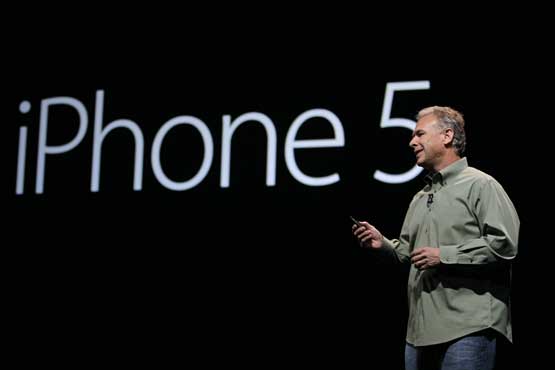 Phil Schiller, Apple's senior vice president of worldwide marketing, speaks on stage during an introduction of the new iPhone 5 at an Apple event in San Francisco, Wednesday Sept. 12, 2012. (AP)
