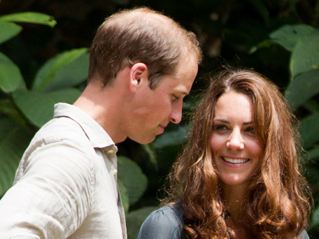 Britain's Prince William (L) and Catherine, the Duchess of Cambridge (R), speak to each other during their visit at the Borneo Rainforest Lodge in Danum Valley, some 70 kilometers (44 miles) west of Lahad Datu, on the island of Borneo on September 15, 2012. The visit of the Duke and Duchess of Cambridge to Malaysia is part of the royal couple's tour to celebrate Queen Elizabeth II's Diamond Jubilee. (AFP)
