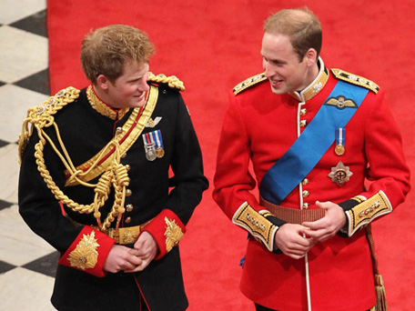 (FILE) Prince William (L) and Prince Harry (R) have a chat as they wait for Kate Middleton at the altar during William's wedding. (BANG)