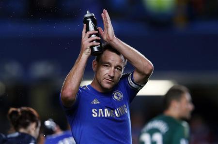 Chelsea captain John Terry salutes the fans after their League Cup match against Wolverhampton Wanderers at Stamford Bridge in London September 25, 2012. (Reuters)
