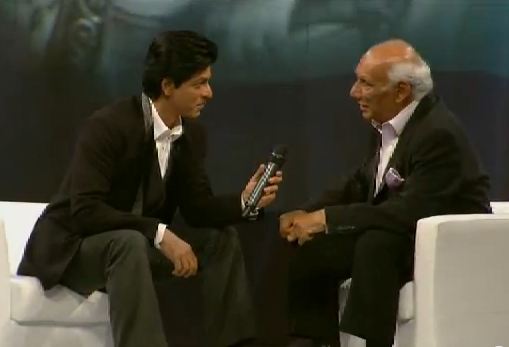 Actor Shah Rukh Khan in conversation with director and mentor Yash Chopra. (Still from video)