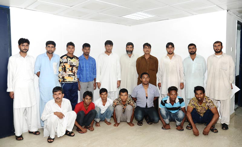 The 17 people arrested for gambling by Sharjah Police.