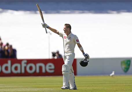 Australia's captain Michael Clarke celebrates reaching a century during the second Test against South Africa at the Adelaide cricket ground on November 22, 2012. (REUTERS)