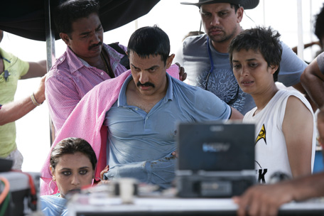 Bollywood actor Aamir Khan with his director Reema Kagti in the set oF 'Talaash'. (SUPPLIED)