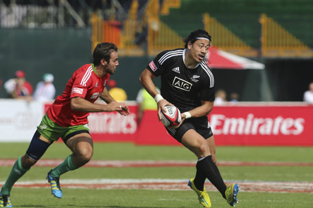 New Zealand's Ben Lam makes a break during the Cup quarter-final against Portugal at the Emirates Airline Dubai Rugby Sevens tournament at The Sevens on Saturday. (SUPPLIED)