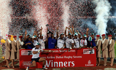 Samoa celebrate with the Emirates Airline International Trophy after winning the Dubai Rugby Sevens at The Sevens on Saturday. (PATRICK CASTILLO)