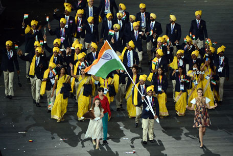 Wrestler Sushil Kumar carries India's flag during the Opening Ceremony of the London 2012 Olympic Games at the Olympic Stadium on July 27, 2012 in London, England. (GETTY)
