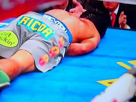 Manny Pacquiao lies motionless after being knocked out in the sixth round by Juan Manuel Marquez at the MGM Grand Garden in Las Vegas, Nevada on December 8, 2012. (TWITTER)