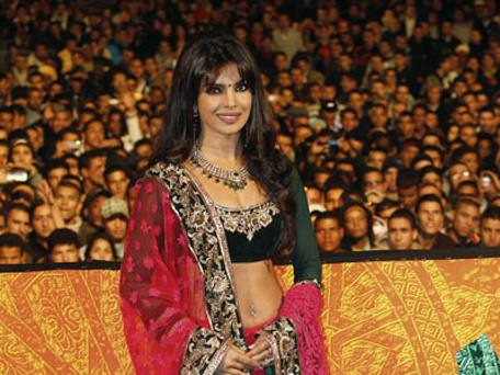 Priyanka Chopra poses for the photographers as she arrives at the screening for "BARFI!" at the Jemaa El Fana Square during the 12th Marrakech International Film Festival in Marrakech, Morocco. (AP)