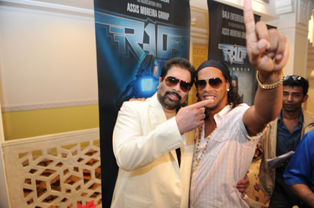 Balaji Rao owner of Blackburn Rovers and Venky's with Ronaldhinho. (SUPPLIED)