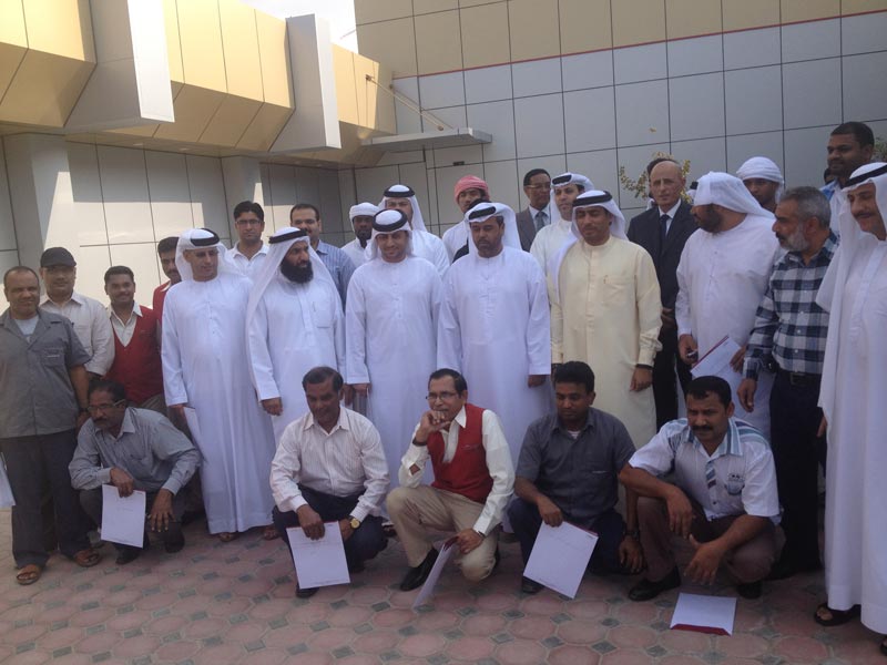 DMI officials with support staff and workers who were rewarded for their services, ahead of His Highness Sheikh Mohammed bin Rashid Al Maktoum's Accession Day on January 4, 2013.