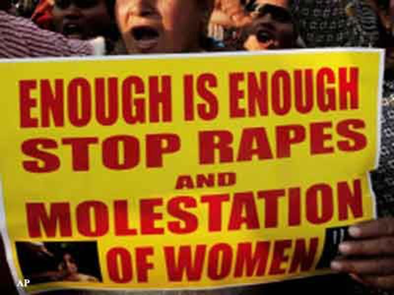 People protesting in Delhi against the recent gang rape of a woman in a bus.