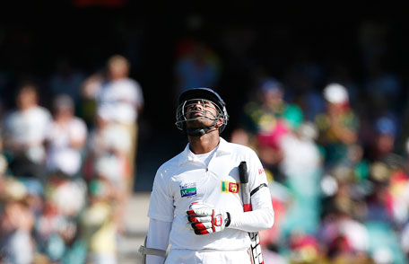 Sri Lanka's Lahiru Thirimanne reacts after being dismissed for 91 by Australia's Nathan Lyon during the first day's play of their third Test at the Sydney Cricket Ground on January 3, 2013. (REUTERS)
