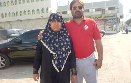 Sajid Ali with his pregnant wife Saeeda (SUPPLIED)