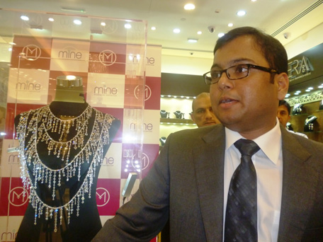 Sham Lal, Managing Director Malabar Gold with the Most Expensive diamond necklace on display, amidst tight security in the Deira City Center Outlet of Malabar Gold. (SUPPLIED)