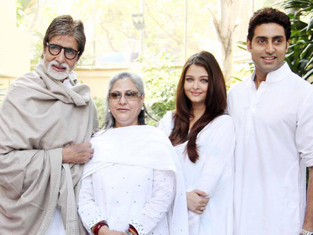 Indian Bollywood actor Amitabh Bachchan (L), accompanied by wife Jaya (2nd L) and son Abhishek (R) with wife Aishwarya Rai Bachchan (2nd R) pose following a press conference in Mumbai on February 9, 2013. (AFP)