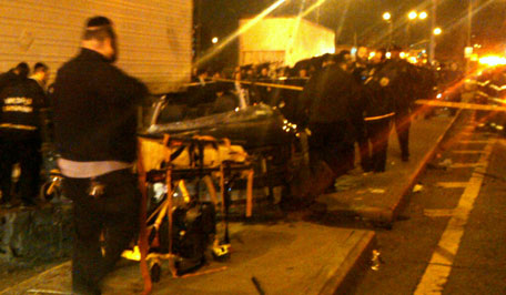In this photo provided by VosIzNeias.com, first responders work at the scene shortly after a car accident in Brooklyn's Williamsburg neighborhood took the lives of Nachman Glauber and Raizy Glauber, an expectant couple Sunday, March 3, 2013, in New York. The young couple who Isaac Abraham, a community leader in the neighborhood, initially said had taken a car service to a hospital for the birth of their first child were killed en route, but their baby boy survived.  Later Abraham said it wasn't clear why the Glaubers were headed there.  (AP