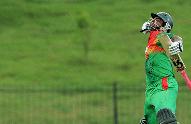 Bangladeshi cricketer Tamim Iqbal celebrates his century (100 runs) during the opening one-day international (ODI) match between Sri Lanka and Bangladesh at The Suriyawewa Mahinda Rajapakse International Cricket Stadium in the southern district of Hambantota on March 23, 2013.  (AFP)